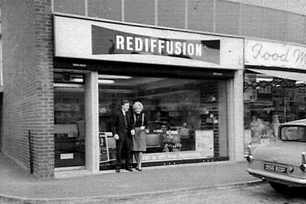 Hounslow shop-front showing Berry Greene with Jane Harnden the receptionist.